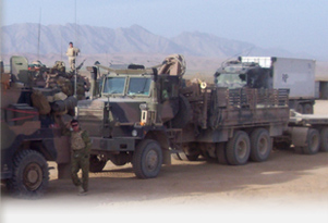 Up-armoured Mack in convoy.