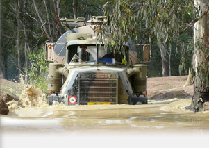 R series Mack undertaking a water crossing